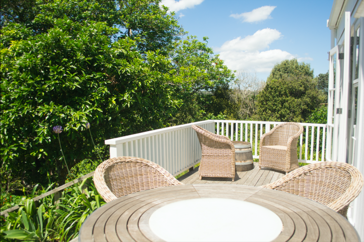 Outdoor dining and seating area at your Waiheke home away from home