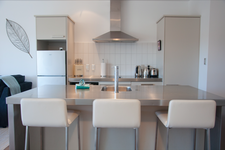 Fully-equipped kitchen in self-catered Condo on the beach