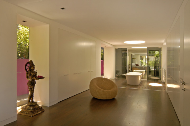 Balinese sculpture and bamboo chair in spacious luxury Byron Bay Villa