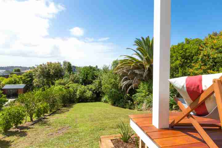 Kids run free in spacious garden area with outdoor deck, in sunny Eight on Church