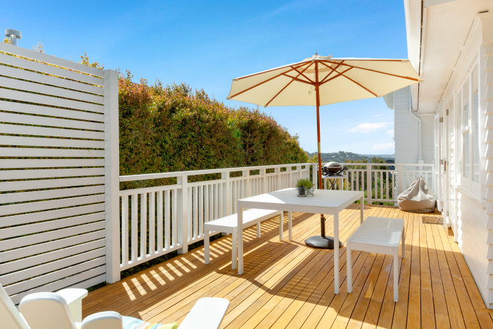 Wine and dine in sunny outdoor area with BBQ and seating at Eight on Church