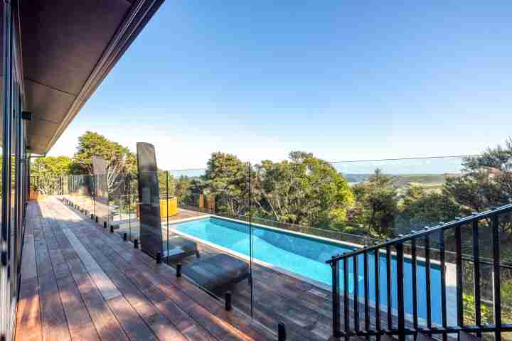 Kaitiaki Lodge Downstairs deck overlooking the pool