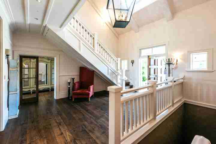 Staircase in Te Rere entrance way with exquisite furnishings and modern ambience