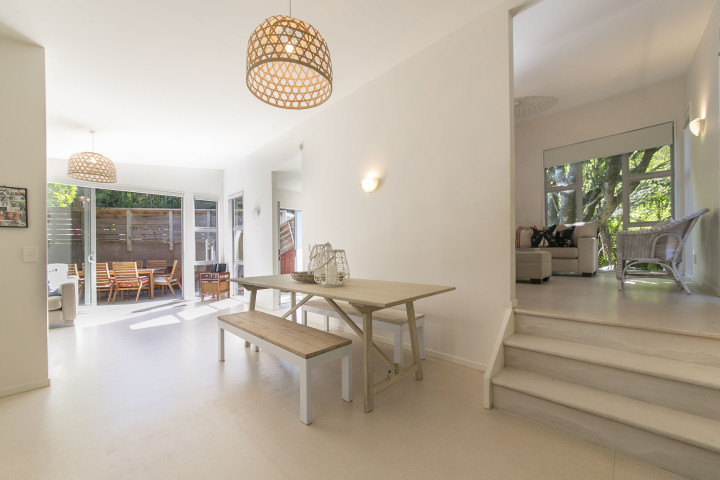 Open plan lounge and dining for your next Waiheke family holiday