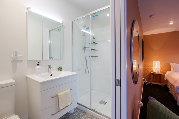 The Pavilion Omiha guest bathroom suite with shower and toilet
