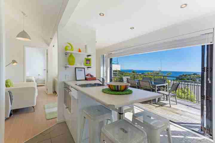 Fully-equipped kitchen at self-catered modern apartment, Palm Beach