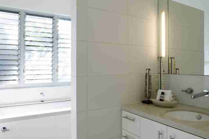 Vanity of bathroom in modern family Australian Whale beach house, Amaroo